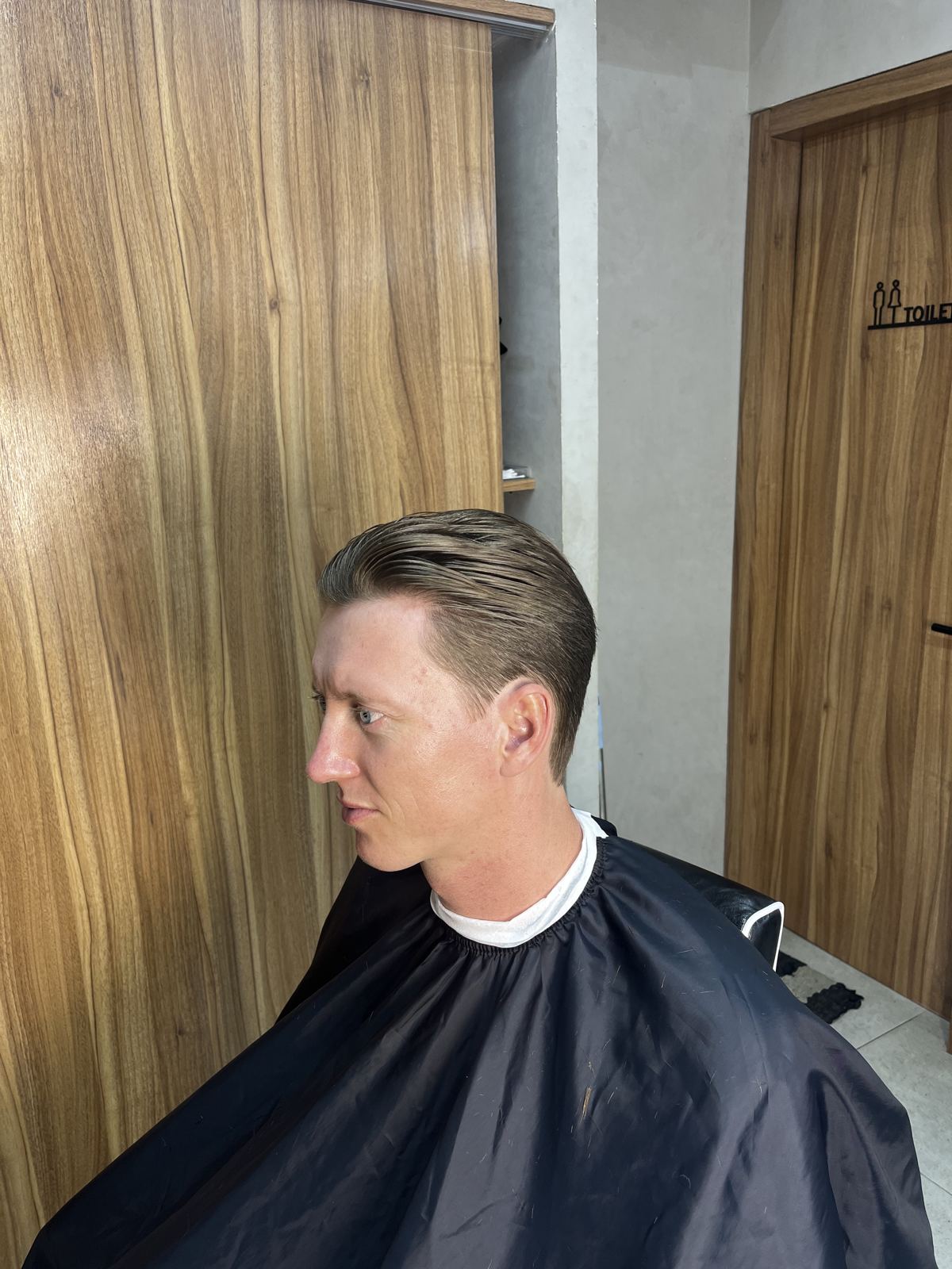 Short side-part cut, side profile