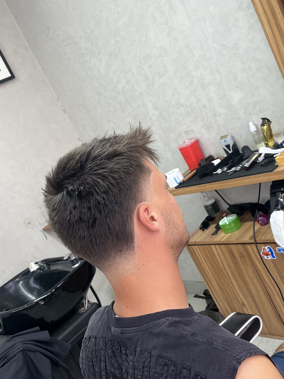Spiky textured top with a fade, back view